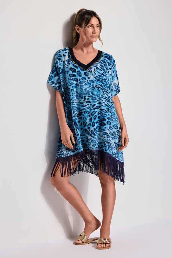 ANIMAL PRINT PONCHO WITH FRINGES